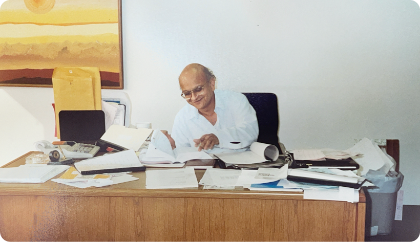 Nitin Shah, CEO of Chem-Impex, at his desk in the 1980s.